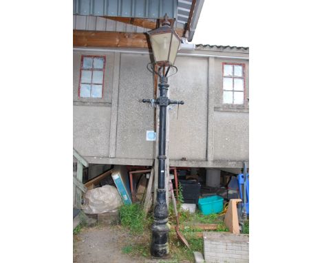 A cast iron street lamp fitted with 240 volt connection.