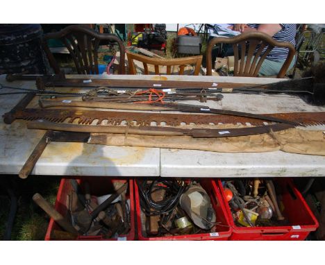 A large sash clamp, flue brushes, cross cut saw, two pruning saws and fire irons.