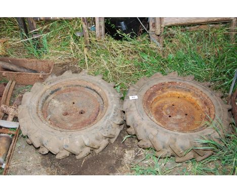 A pair of 400/12 tractor grip implement wheels and tyres.