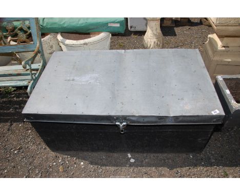 A large metal trunk, 41 1/2'' x 23'' x 18'' high.