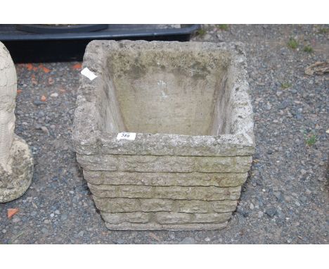 A square planter, 15'' square x 12 1/2'' high.