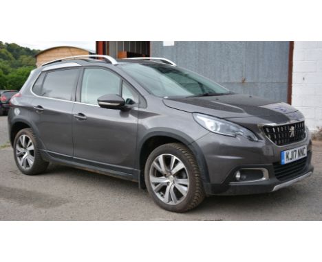 A Peugeot 2008 1.6 e-HDi Allure Sport Utility, diesel-engined, 5 speed manual gearbox five-door hatchback motor car in Nimbus