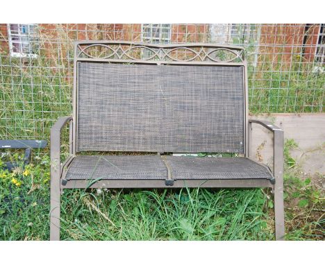 A two seater garden bench.