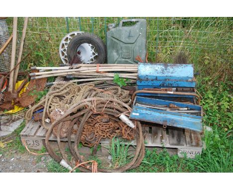 A cantilever toolbox with various old spanners, jerry can 1980, small garden gate, 358 tyre, old rope etc.