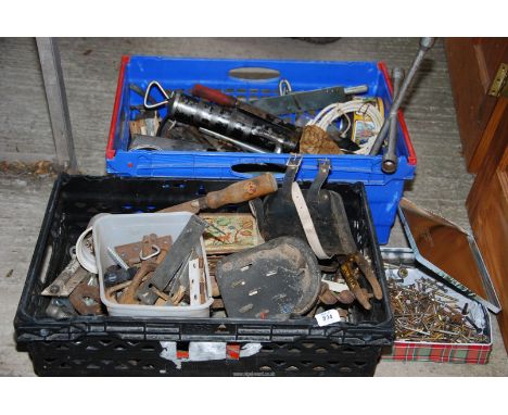 Two boxes of grease guns, wheel spider, gate fastenings, various tools etc.