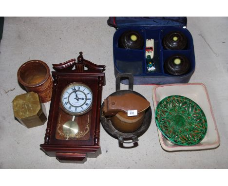 A wall clock, bowls, plates, brass tea caddy, measure etc