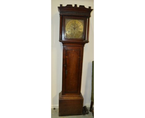 A late 18th Century oak longcase clock with eight day striking movement and brass face inscribed Bradley Worcestershire enclo