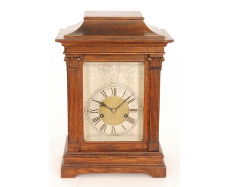 An early 20th Century oak cased bracket clock in the Georgian style, the silvered dial with Roman chapters, signed J.B. Yabsl