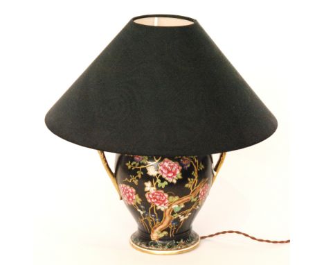 An early 20th Century Cetem Ware (Maling) Aesthetic table lamp, the twin handled body in black with an enamel and gilt flower