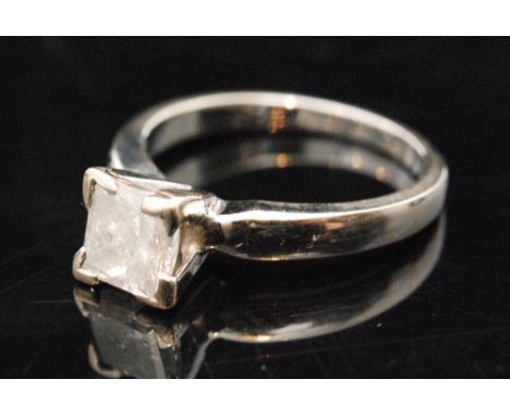 A contemporary 18ct diamond solitaire ring, princess cut claw set stone, weight 1.00ct colour J/K, clarity P3. 