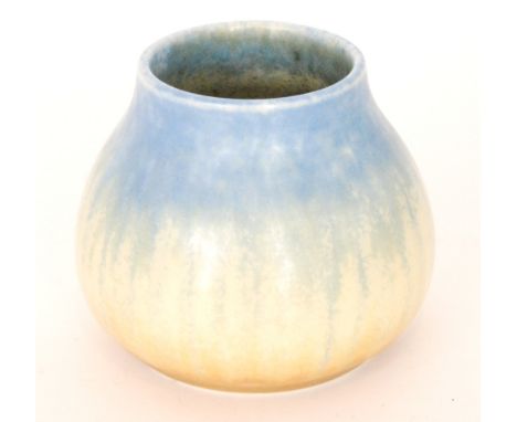 A small Ruskin Pottery vase of compressed ovoid form with a blue to yellow crystalline glaze, incised Howson Taylor, impresse