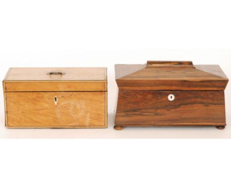 A 19th Century rosewood sarcophagus, lead lined tea caddy mirror backed hinged lid opening to compartmental interior, all rai