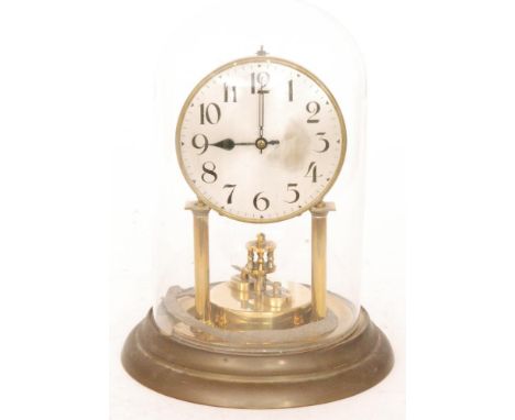 A 20th Century 365 day clock, circular dial in glass dome, height 31cm