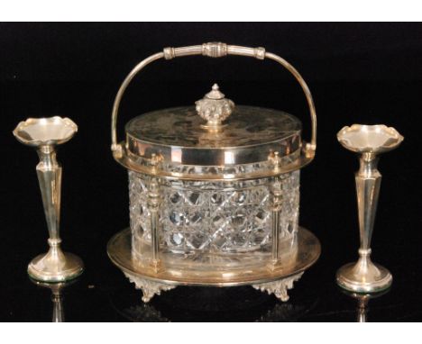 A late Victorian cut glass biscuit box with silver plated mounts of oval outline with hinged cover and cast foliate finial, t