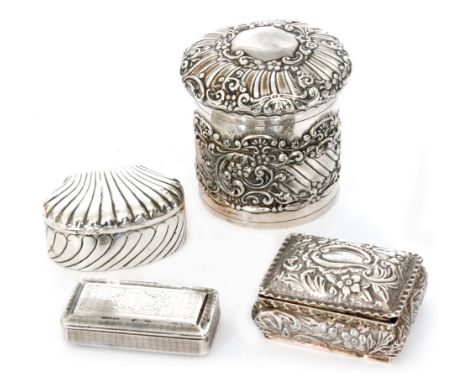 A hallmarked silver cylindrical jar and cover with foliate decoration to whole, height 8cm, with two similar small boxes and 