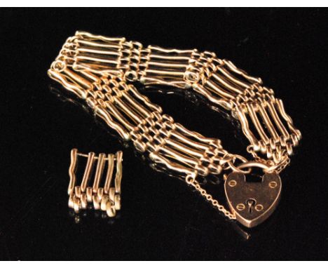 An early 20th Century 9ct rose gold five bar gate bracelet terminating in padlock fastener, with a conforming spare link, tot