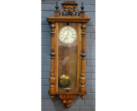 A small 19th French pressed gilt metal mantle clock and dome, height 26cm and a 19th Century walnut regulator wall clock (2)