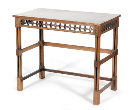 A mahogany silver or side table in the Chippendale Revival taste, with a pierced apron frieze above turned supports, height 7