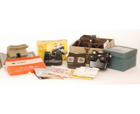 A collection of assorted Viewmaster stereoscopes and reels and a small child's projector (qty)