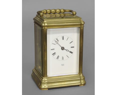 A BRASS CARRIAGE CLOCK BY DENT OF LONDON, the dial signed Dent, London, on a brass repeating movement striking half hourly to