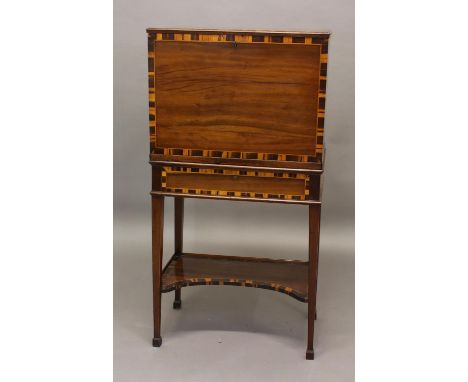 A MAHOGANY CROSSBANDED SECRETAIRE CABINET ON STAND, late 19th century, the fall-front enclosing an arrangement of pigeonholes