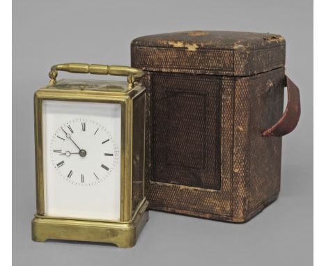 A 19TH CENTURY BRASS CASED CARRIAGE CLOCK, the white enamelled dial on a brass, eight day repeating movement stamped with ser