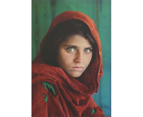 Steve McCurry (American, b.1950)Afghan Girloffset lithograph in colours, signed 'Steve McCurry' in pen l.r.image 49.3 x 33cmS