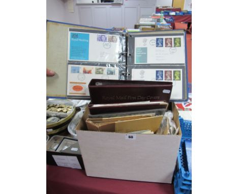 G.B. First Day Covers, in two full albums and loose, with All World oddments. Generally 1960's - 1980's with some more intere