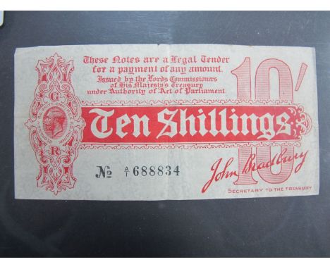 A John Bradbury First Issue Ten Shillings Treasury Note, number A1 688834. Some folding and other faults.