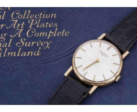 A 1970's Longines 9ct gold manual wind presentation wristwatch, 30mm case with Wilkinson Sword inscription to case, with sati