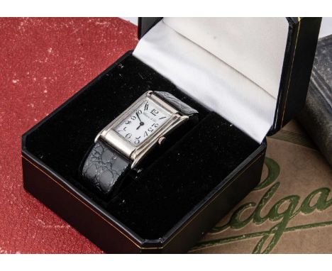 A c1990s manual wind silver cased wristwatch from Gleave & Co, 26mm, As Found, case is scratched and glass damaged to lower, 