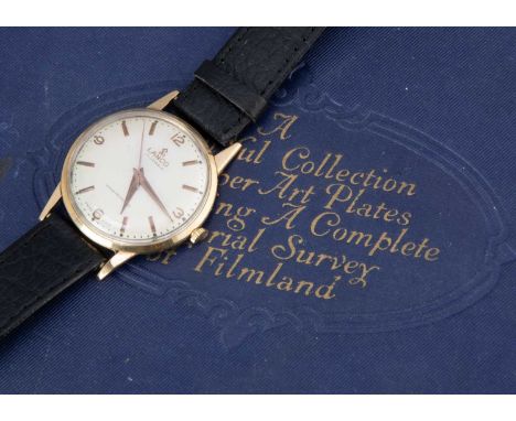 A c1960s Lanco manual wind 14ct gold cased wristwatch, 34mm, silvered dial with batons, appears to run, marked to rear cover,