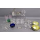 Collection of glassware includes sherry glasses, liqueur glass, cobalt blue sundae dish, cut glass