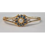 18ct yellow gold hinged bangle set with central brilliant cut diamond approx. 0.50ct (colour F,