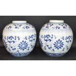 Pair of Chinese blue & white porcelain ginger jars with blue character marks & later holes to base