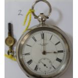 American Waltham open face silver pocket watch with key, working. Serial number 8449412