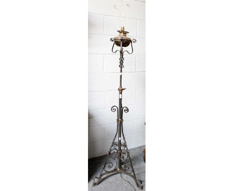 A Victorian Wrought Iron and Copper Standard Oil Lamp, converted to electricity, 156cm high to fitting