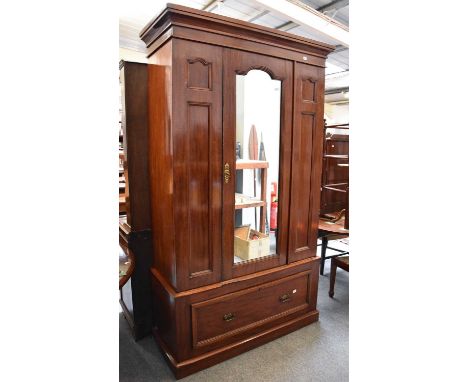 A Mirror Fronted Wardrobe, 121cm by 49cm by 206cm; together with three reproduction tripod tables, an oak plant stand, a leat