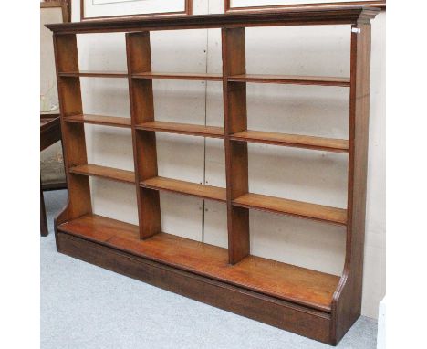 An Oak Open Bookcase, 208cm by 32cm by 149cmTop section lifts off the base, 38cm by 207cm. Generally in good overall conditio