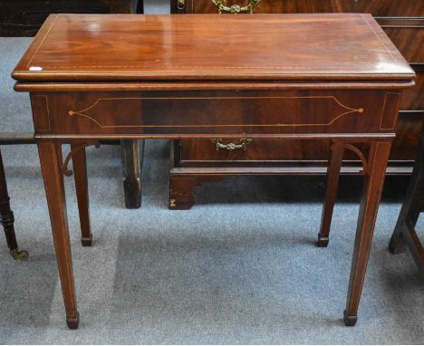 A Georgian Mahogany Fold Over Tea Table, 91cm by 45cm by 73cm; together with an inlaid mahogany fold over card table of simil
