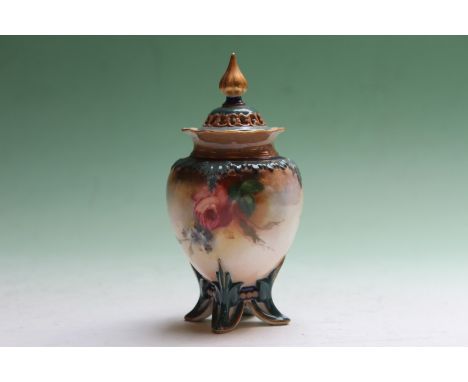 A Royal Worcester pot pourri, painted with roses, 13cm high.