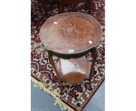 A French parquetry inlaid ormolu mounted lamp table, the shaped top with conforming undertier