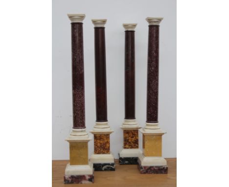 A pair of antique porphyry and white marble architectural form columns, together with a matching roso antico and white marble