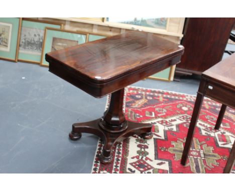 An early Victorian rosewood card table, with faceted pedestal, on platform base with bun feet, 92cm wide