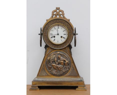 A Victorian gilt brass cased mantel clock, with electrotype relief panel depicting Old Father Time, two train French bell str