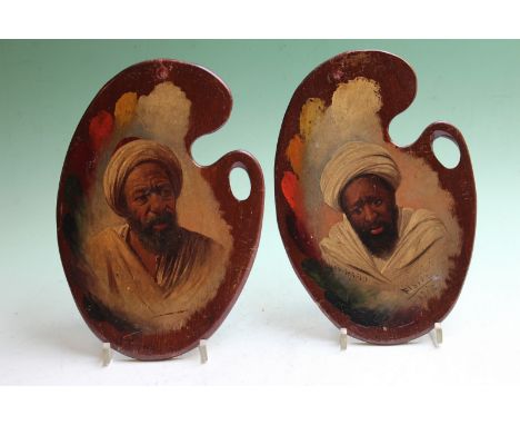 A pair of artist's mahogany palettes, painted with portrait scenes of Maley Hafid and a Tupien, 24 x 16cm