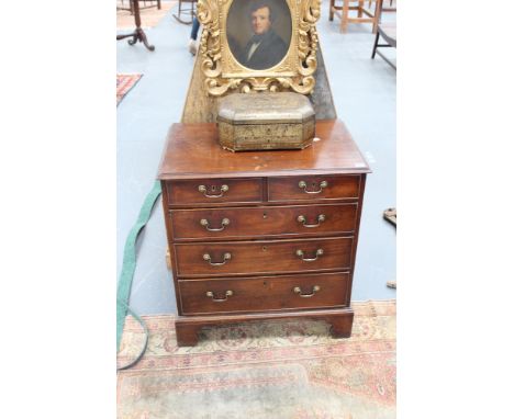 A small mahogany Georgian chest, the moulded edge top above two aligned short drawers and three graduated long drawers, on br
