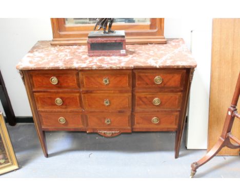 A Continental marble top neoclassical commode, with parquetry inlay and ormolu mounts, three long drawers, 122cm wide