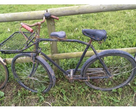 A Vintage trade bike with additional saddle