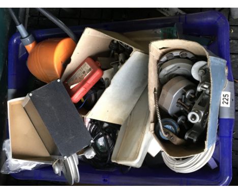 A box containing tools and aluminium cast flywheels